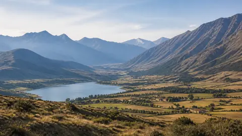 An Andes mountain valley with a lake